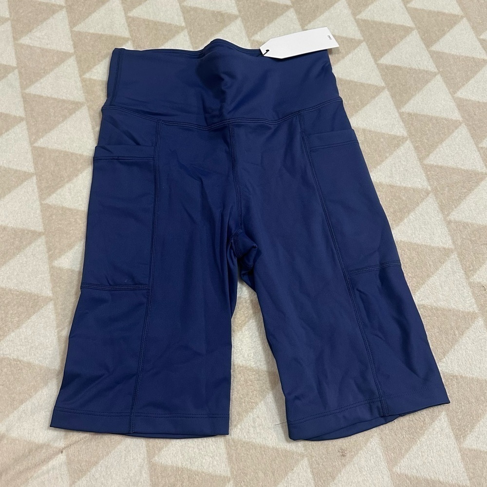 Universal standard blue bike shorts knockout cycling